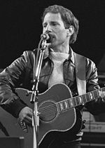 Paul Simon performing at the Feijenoord Stadion, Rotterdam, The Netherlands in 1982.