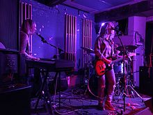 Petal (Kiley Lotz pictured right) performing at Wharf Chambers, Leeds in May 2017, with Slingshot Dakota acting as backing band Petal performing at Wharf Chambers, Leeds, UK, 2017.jpg