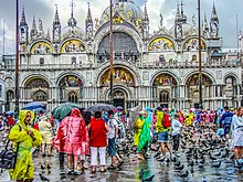 Pigeons intermingle with tourists in Venice Pigeons and tourists.jpg