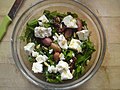 Salad made from fresh greens (local name "pissara" in Kefalonia), sun-dried tomato, feta and pine-nuts.