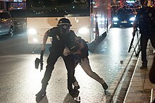 A General Directorate of Security riot control officer using force on a protester during the Gezi Park protests in Turkey Police action during Gezi park protests in Istanbul. Events of June 15, 2013-6.jpg