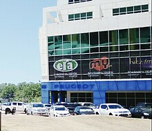 The advertisement of Peninsular-based radio stations: Era FM, My FM and Hitz FM in a building, showing the radios had set up their offices in the capital city of Sabah.