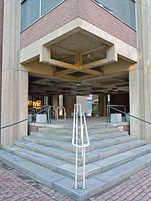 Entry porch ceiling showing the building's support structure, which is composed of prefabricated concrete elements that were assembled like children's blocks RnG labs entrance porch.JPG