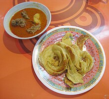 Roti canai and mutton curry, Indian influence on Indonesian cuisine Roti Cane Kari Kambing Aceh.jpg