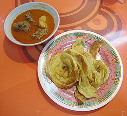 Roti canai and mutton curry, Indian influence on Indonesian cuisine. Roti Cane Kari Kambing Aceh.jpg