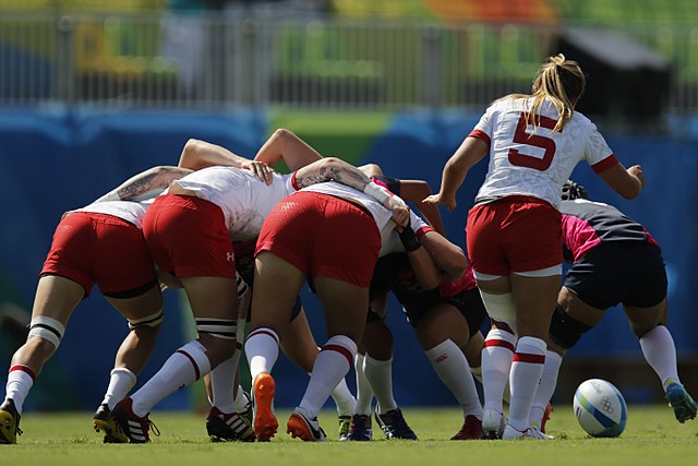 During a scrum in rugby sevens, three players from each team participate instead of eight.