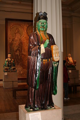 A glazed stoneware statue of a Judge of Hell, Ming dynasty, 16th century, in the British Museum.