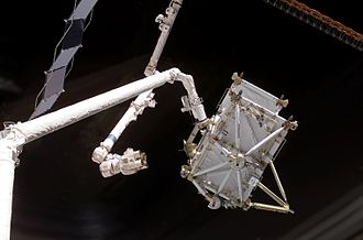 The Canadian-built Space Shuttle robotic arm (left), referred to as Canadarm, transferred the P5 truss segment over to the Canadian-built space station robotic arm, referred to as Canadarm2 STS-116 - P5 Truss hand-off to ISS (NASA S116-E-05765).jpg