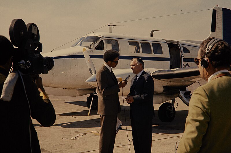 File:Secretary of the Interior Hickel talking into a microphone by a airplane in Independence National Historical Park. (892a201ab7c34220962dd00ae39575ce).jpg