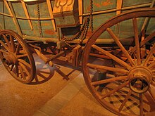 Close view of a Conestoga wagon's running gear (front wheels left, rear wheels right), Heinz History Center Senator John Heinz History Center - IMG 7655.JPG