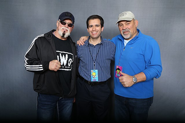 Steiner worked for several years with his brother Scott. In the picture, Scott (left) and Rick (right) in 2018 posing with a fan