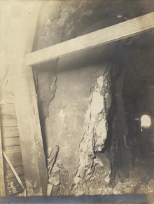 The slip on the San Andreas Fault which caused the earthquake was visible in Wrights Tunnel along the South Pacific Coast Railroad after the earthquake, with the north tunnel portal in the background and Wrights, California, just outside of the portal Summit Tunnel (Tunnel 2) with damage from the 1906 San Francisco earthquake near north portal.png