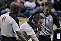 Image 20NBA officials Monty McCutchen (center), Tom Washington (#49) and Brent Barnaky reviewing a play. (from Official (basketball))