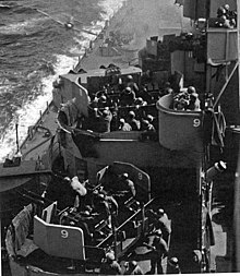 A kamikaze (top left) moments before striking Missouri's side USS Missouri Zero Kamikaze.jpg