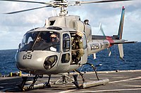 US Navy 070505-N-7029R-061 Crewmembers from a Brazilian navy helicopter prepare to take off from USS Pearl Harbor (LSD 52) during UNITAS exercises.jpg