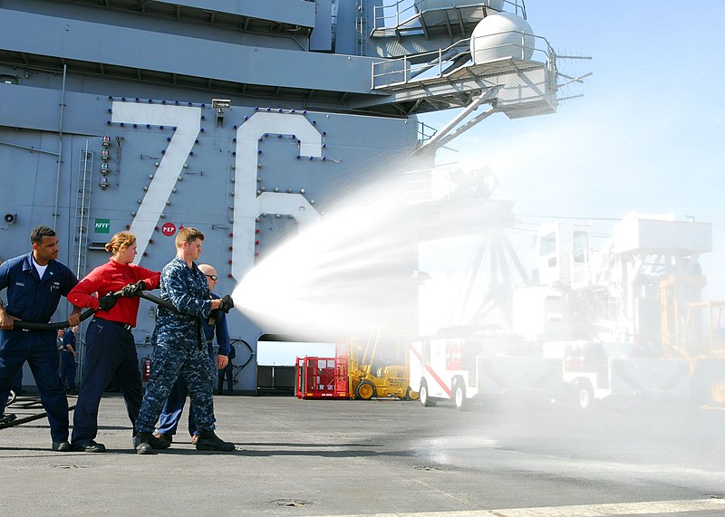 File:US Navy 100825-N-5684M-141 Airman Nick Green mans the nozzle of an Aqueous Film Forming Foam (AFFF) hose.jpg