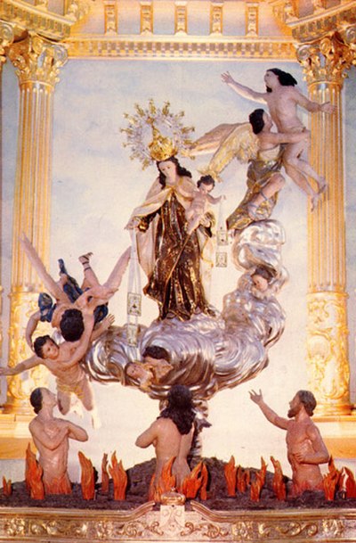 Our Lady of Mount Carmel with angels and souls in Purgatory. Baroque sculpture from Beniaján (Spain).