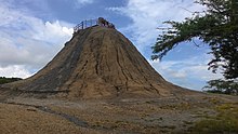 In this leg's Roadblock, one team member had to search for an emerald inside the mud bath atop El Totumo Volcano. Volcan del Totumo.jpg