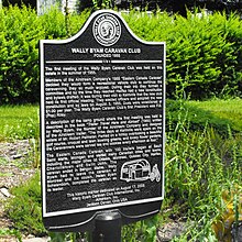 Site marker of the founding meeting of the Wally Byam Caravan Club, in 1955 in Kentville, Nova Scotia, Canada. The plaque shows Alfred Letourneur towing an airstream trailer in 1947 WallyByamCaravanSite.JPG