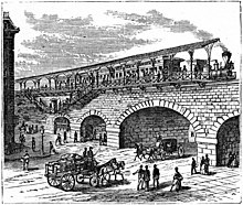 1875 sketch of the station, looking east. Minor errors are present in this early depiction, including the street level window and entrance. 110th St station.jpg