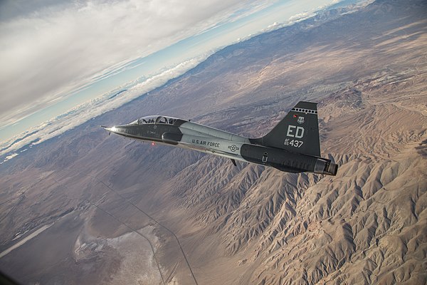 A T-38C assigned to the 416th Flight Test Squadron, 412th Test Wing, Air Force Test Center, flies over the Mojave desert near Edwards AFB, California