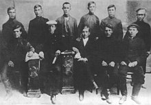 Makhno (bottom left) sitting with other members of the Union of Poor Peasants in 1907