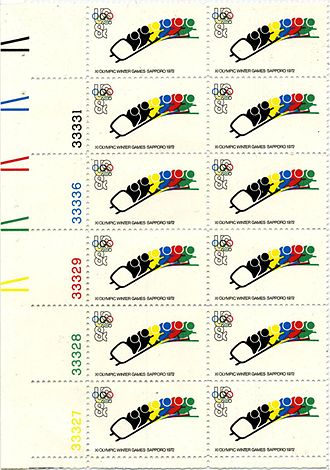 A US plate block from 1972. Note the addition of a number for each color. This increased the cost of collecting plate blocks. That, plus the format change, discouraged many collectors. 1972OlympicWinterGames-USPostageStamp.jpg