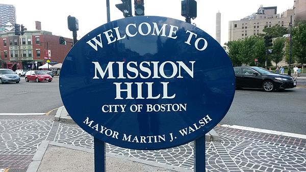 Welcome sign in Brigham Circle intersection, Mission Hill, Boston, near front of Stoneman Plaza, Brigham and Women’s Hospital (BWH)