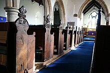 The unusual bench-ends in the church Bench Ends in St.Helen's church - geograph.org.uk - 146745.jpg