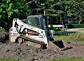 A Bobcat T650 compact track loader (PIN A3P111627). A side view. 2016.