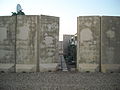 These cement wall segments lined every building on base to mitigate damage from mortars/rockets