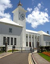 Completed in 1960 the (second) City Hall of Hamilton was inspired by traditional cottage design, though its central tower demonstrates a Scandinavian influence. City Hall in Hamilton, Bermuda.jpg