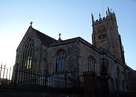 De kerk van Beaminster bij zonsondergang