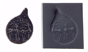 Drop-shaped (tanged) pendant seal and modern impression. Quadrupeds, ca. 4500–3500 B.C. Late Ubaid - Middle Gawra. Northern Mesopotamia.jpg
