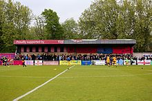 South side covered terrace in April 2017. Dulwich Hamlet v Enfield Town, 27 April 2017 (01).jpg