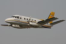 A Payam Air Embraer EMB-110 departs Dubai International Airport, United Arab Emirates in 2005. Embraer EMB-110P1A Bandeirante, Payam Air AN0928044.jpg