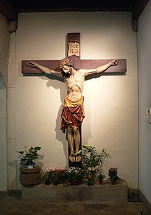 The Crucifix, cross with the corpus (Body of Christ) is an ancient symbol used within the Catholic Church, Eastern Orthodox churches, Anglican, and Lutheran churches. Essen Kreuzgang 3 Kruzifix.jpg