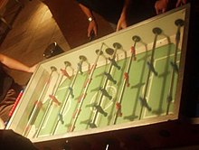 A Garlando style table with a game in progress Foosball garlando aerial.jpg