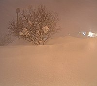 Fulton, New York, after a snowburst dropped 4–6 feet (122–183 cm) of snow over most of Oswego County January 28–31, 2004