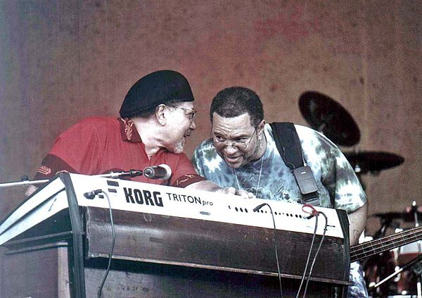 Neville (left) and George Porter Jr. of the Funky Meters at New Orleans Jazz & Heritage Festival 2004