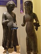 A 6th century Buddha statues (left) found at Ipoh. A 9th century Hindu priest teacher statue (right) found at Jalong, Perak.