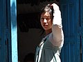 Girl in Shop Doorway - Bhaktapur - Nepal (13509301443).jpg