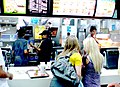 Girls buying hamburgers at McDonald's.