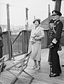 HM Queen Elizabeth on the bridge of the SS QUEEN MARY acknowledging cheers from passing ships during a trip down the Clyde, 4 June 1942. A8707.jpg