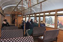 Steam Railmotors featured large saloons and tram-style turn-over seats so they appeared much more spacious and modern than the compartment trains that were the norm in the United Kingdom at the time Inside GWR Steam Railmotor 93 large saloon.jpg