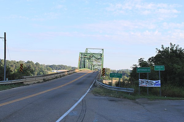 The old J.M. Walters truss bridge, which carried US 25E across the French Broad River, until its demolition and replacement in 2017