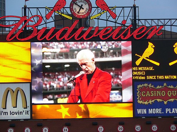 Video Replay on the scoreboard at Busch Stadium shown on the 5th anniversary of the 9/11 attacks of Buck reading his For America poem at Busch Memorial Stadium before the first Cardinals game after the 9/11 attacks.