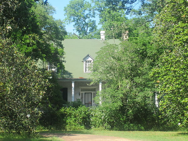 Hidden by trees, the Magnolia Plantation is located in the Cane River Creole National Historical Park.