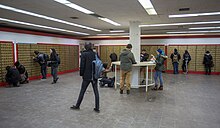 Students attend an unstaffed postal facility Mailroom in University.jpg