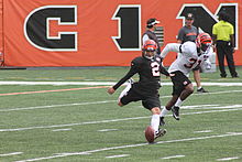 Nugent kicking off during the Bengals' training camp in 2012 Mike Nugent kicks off for Bengals training camp.jpg